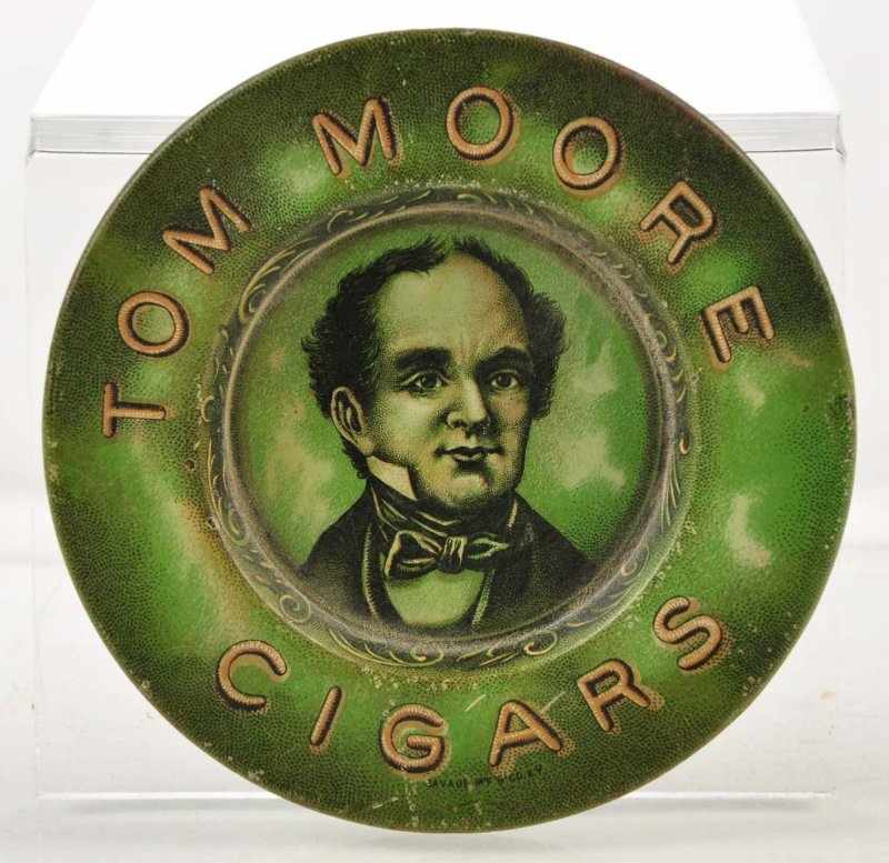 Appraisal: Tom Moore Cigar Tip Tray Description Nice round tin tip