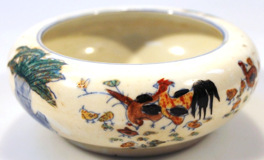 Appraisal: A Chinese porcelain bowl of circular outline polychrome decorated with