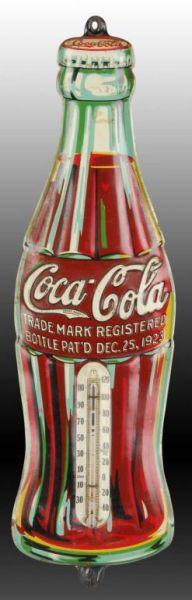 Appraisal: Coca-Cola Embossed Tin Bottle Thermometer Description Few minor bends some