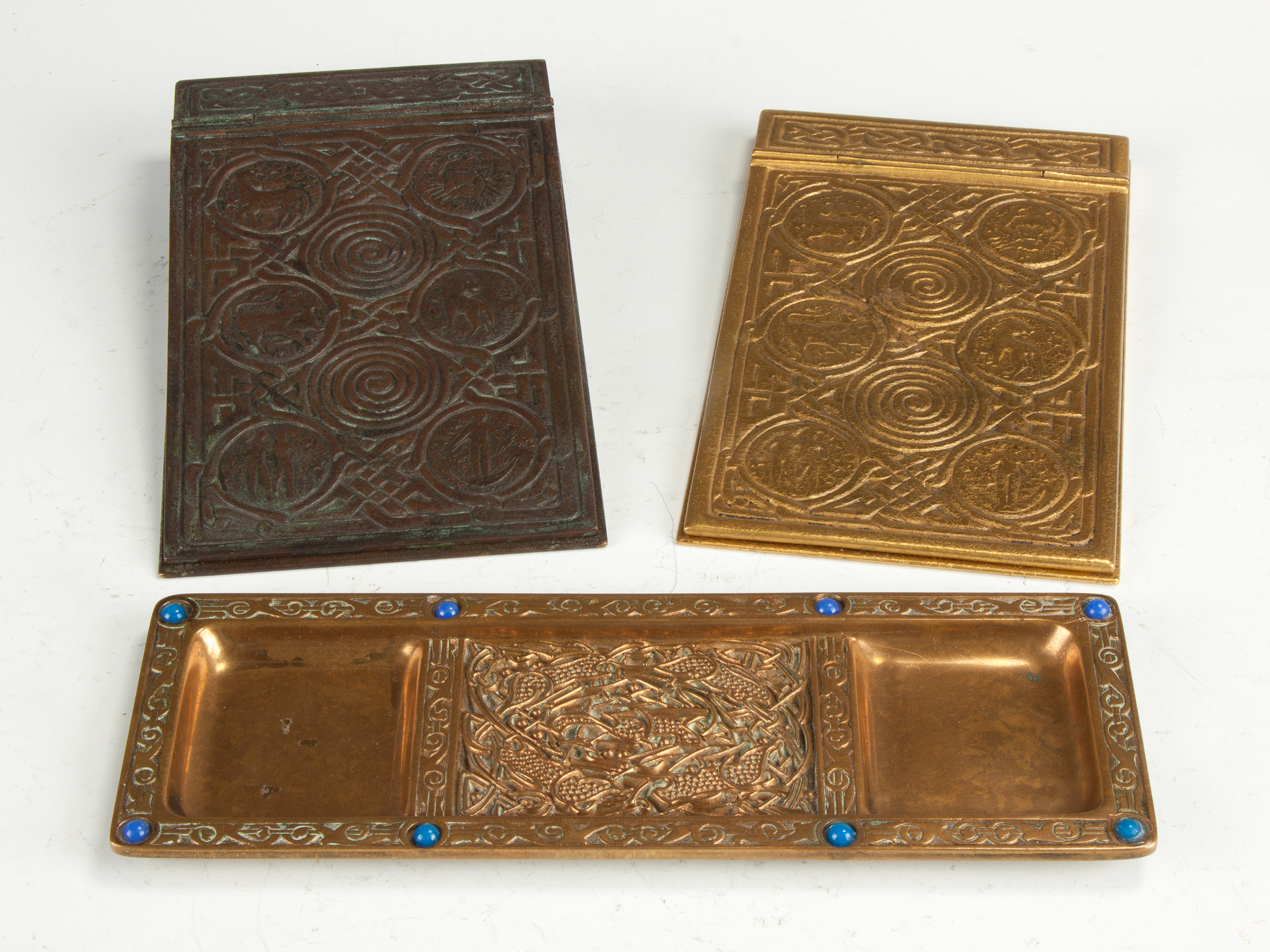 Appraisal: Two Tiffany Studios Bronze Memo Pad Zodiac Pattern Pen Tray