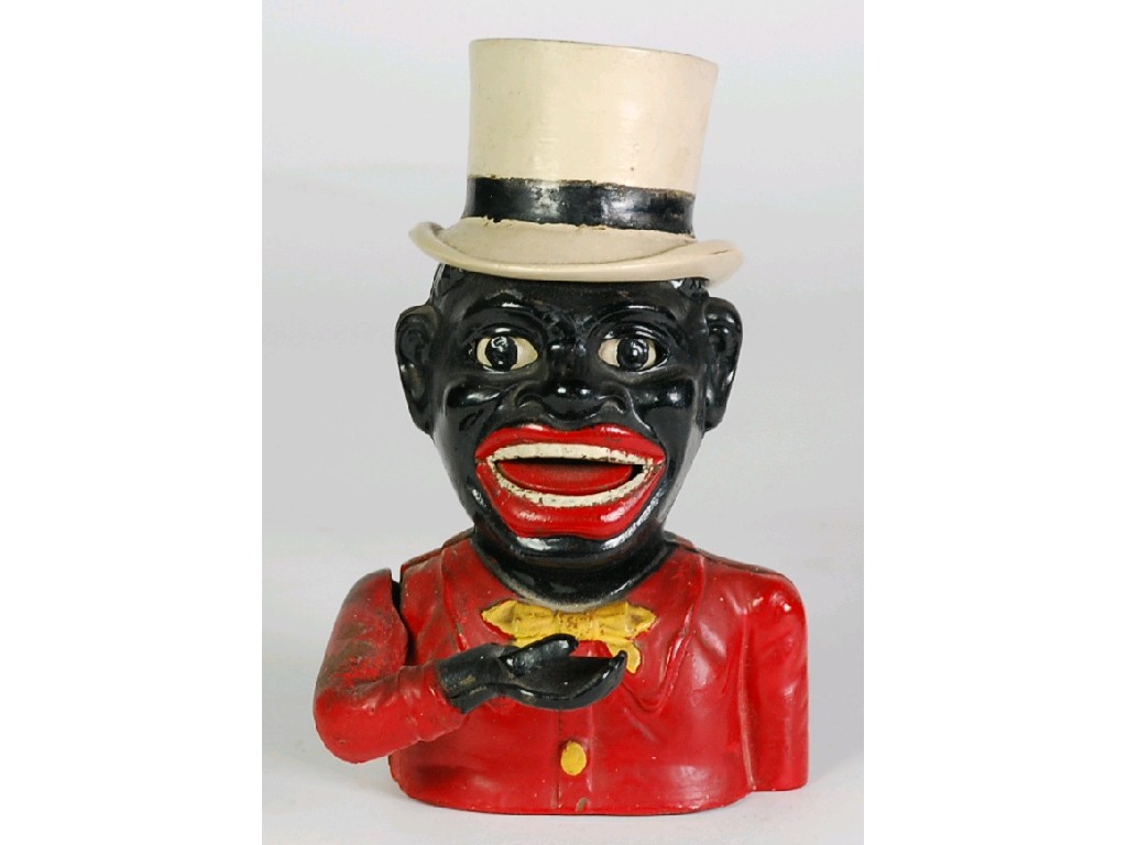 Appraisal: CAST IRON 'JOLLY' MONEY BOX typically modelled wearing top hat