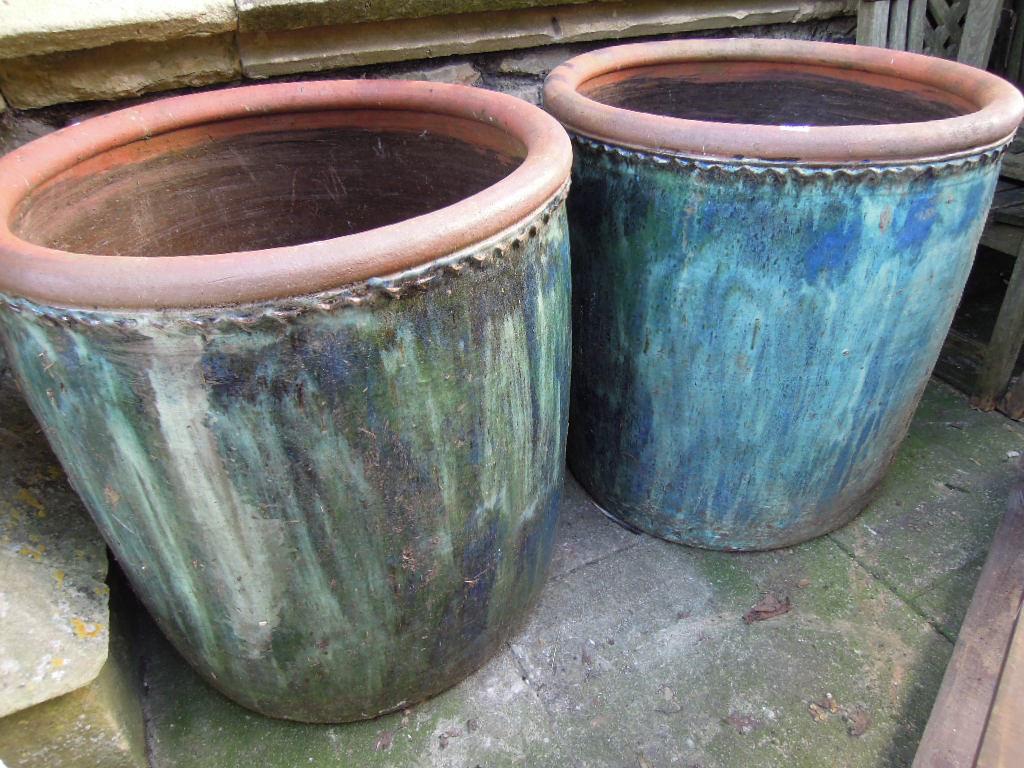 Appraisal: A pair of large blue and green glazed terracotta planters