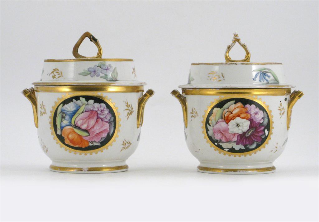 Appraisal: A pair of English porcelain wine coolers and covers