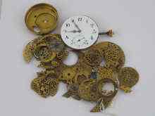 Appraisal: A mixed lot of watch parts including balance clock covers