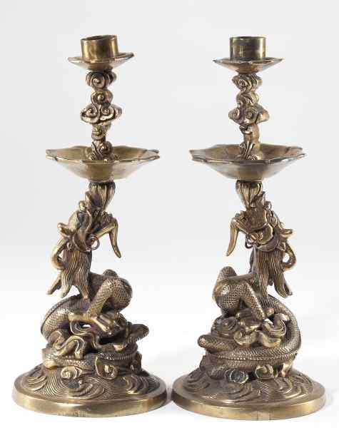 Appraisal: Pair of Chinese Dragon Form Candlestickslate th-early th century cast