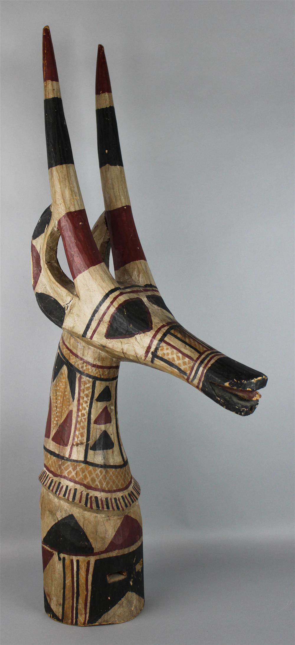 Appraisal: KURUMBA ANTELOPE POLYCHROME PAINTED CARVED HEADDRESS BURKINA FASO painted in