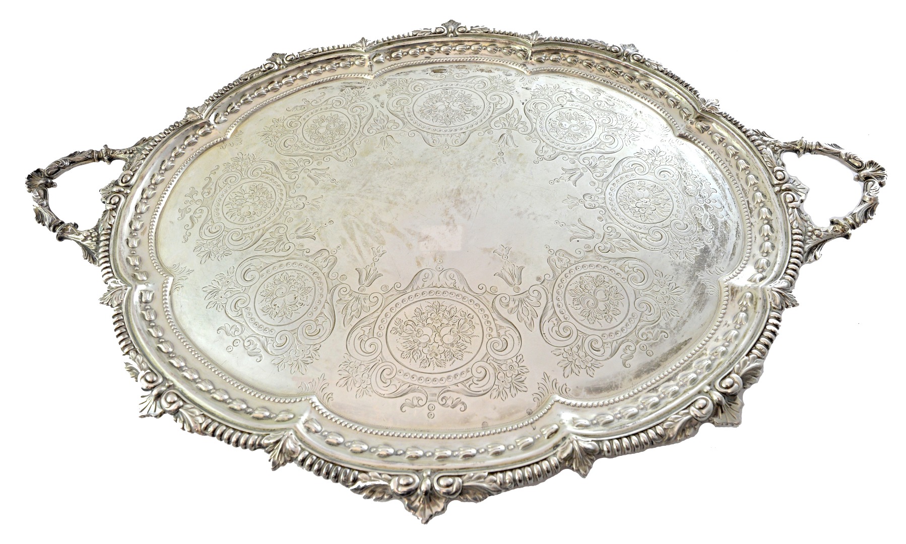 Appraisal: A late Victorian silver twin handled tray of shaped oval