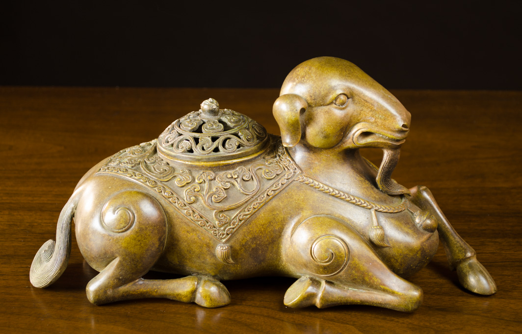 Appraisal: CHINESE QING STYLE GOLDEN BRONZE GOAT CENSOR depicting a goat