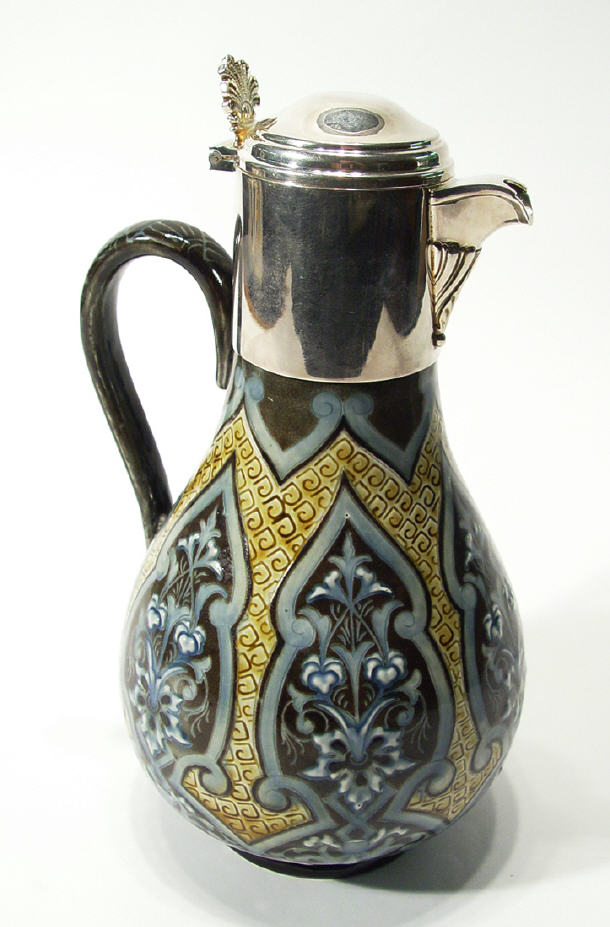 Appraisal: Doulton Lambeth stoneware claret jug by Eliza Simmance with silver