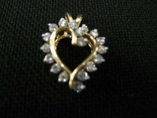 Appraisal: Diamond Heart Pendant round diamonds totaling carat in k yellow