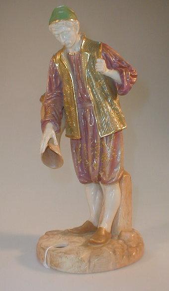 Appraisal: A Royal Worcester Cairo ware figure of a male water