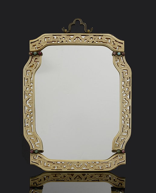 Appraisal: A Chinese ivory and hardstone mirror th Centurythe open fretwork