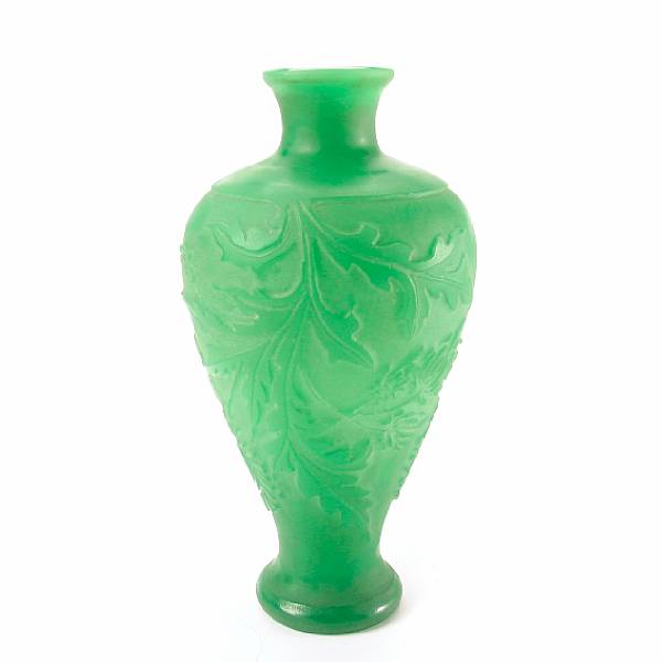 Appraisal: A Stueben jade green acid cut back glass vase drilled