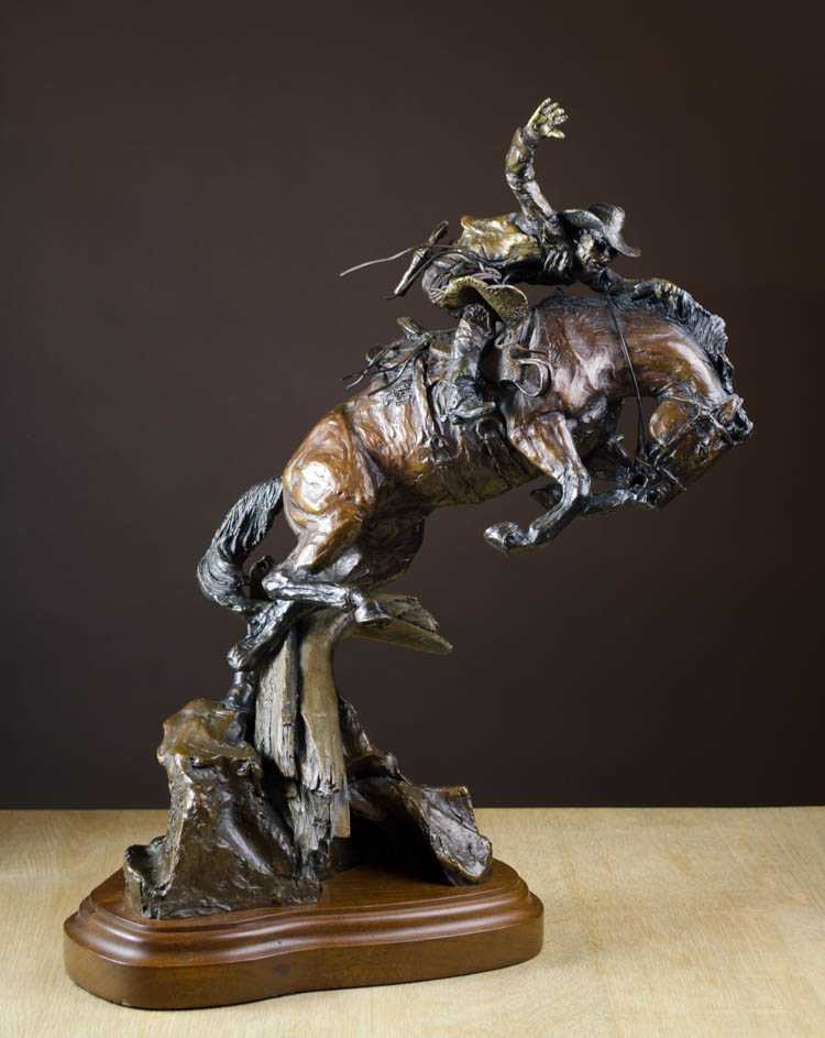 Appraisal: LORENZO GHIGLIERI BRONZE SCULPTURE Oregon born Cowboy on horseback jumping