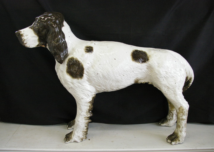 Appraisal: Large Italian Black-and-White-Glazed Faience Figure of a Spaniel h l