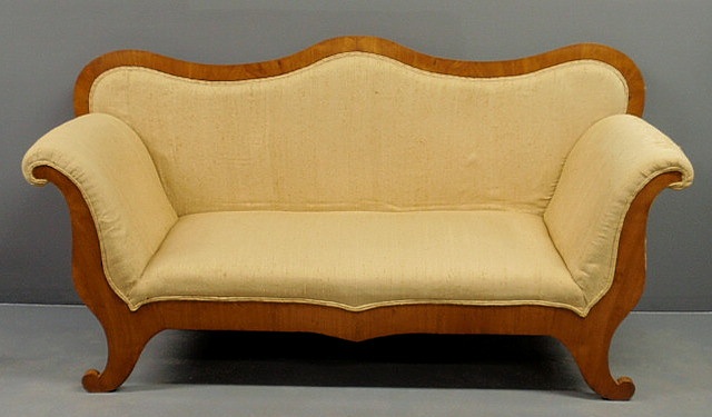 Appraisal: Biedermeier sofa th c with shaped back scrolled arm supports