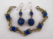 Appraisal: A white metal lapis lazuli bracelet and earring set Bracelet