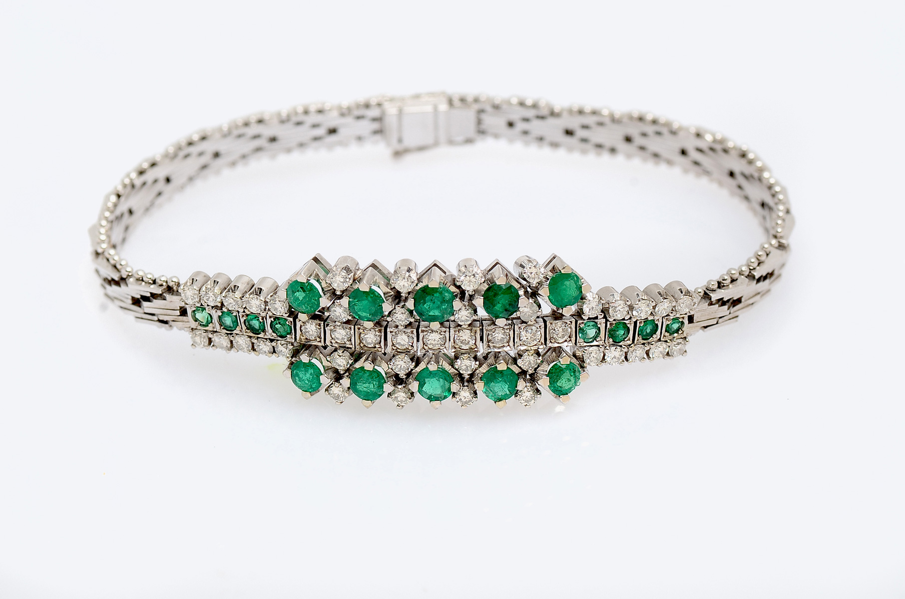 Appraisal: K EMERALD DIAMOND BRACELET round faceted emeralds approx CTW and