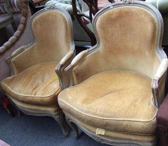 Appraisal: A pair of late th century cream painted feuteils with