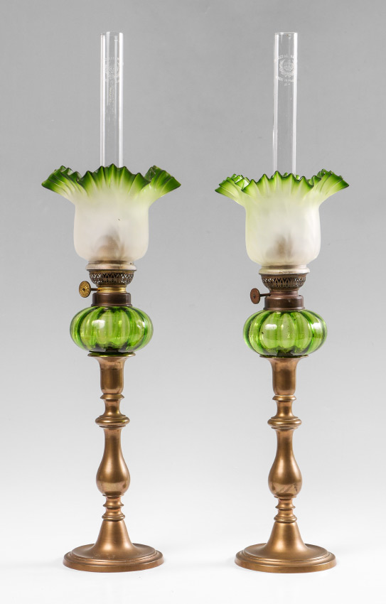 Appraisal: PAIR OF PEG CANDLESTICK LAMPS peg oil lamps with green