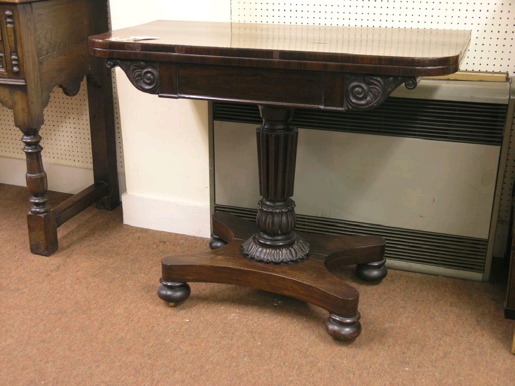 Appraisal: A William IV rosewood veneered card table hinged top enclosing