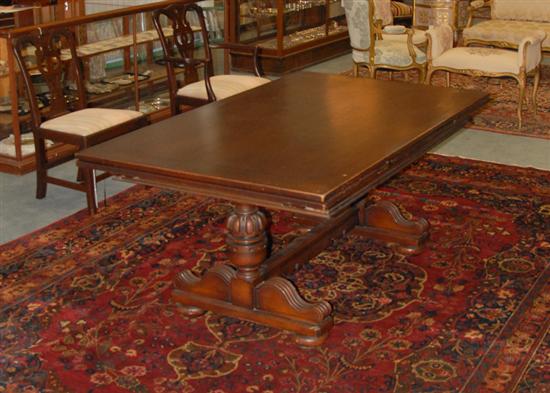 Appraisal: A Mahogany Draw-leaf Dining Table a trestle table in the