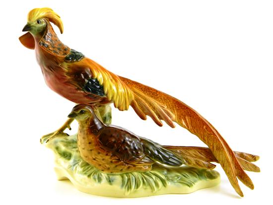 Appraisal: Ceramic pheasant centerpiece marked Eaphila Germany and on base male