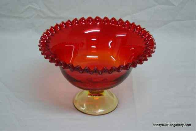 Appraisal: Large Amberina Glass Crimped Edge Footed BowlThis is for a