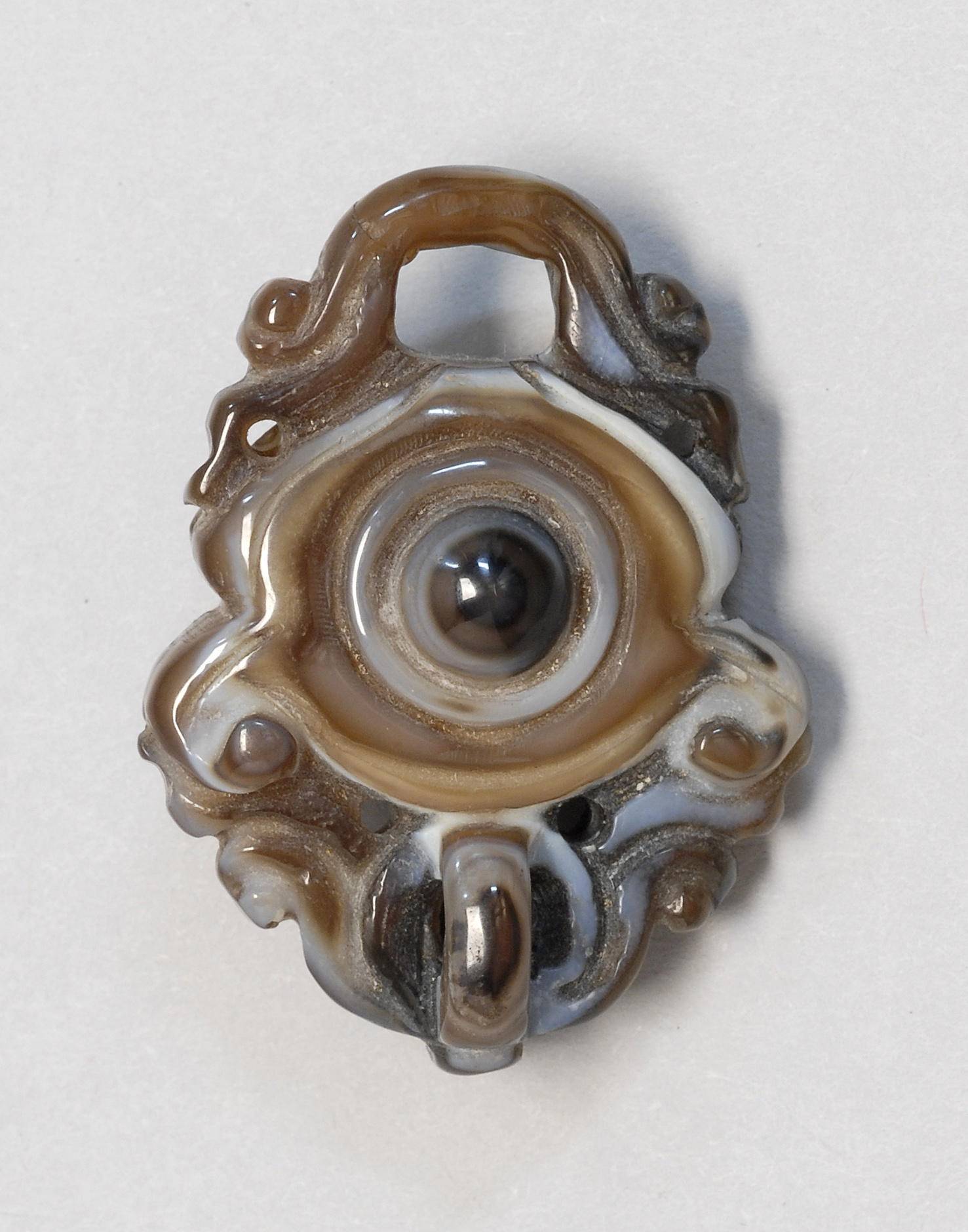 Appraisal: UNUSUAL CHALCEDONY AGATE PENDANT th CenturyWith all-seeing eye design in