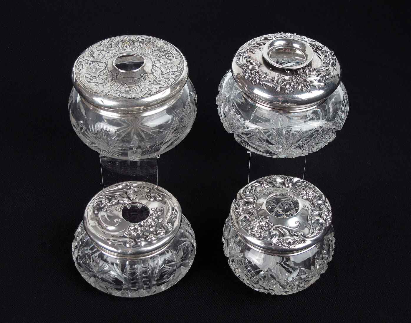 Appraisal: ART NOUVEAU STERLING LIDDED HAIR RECEIVERS To include Wallace floral