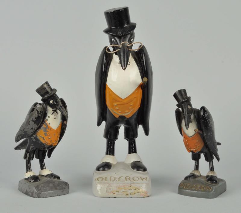 Appraisal: Lot Of Old Crow Whiskey Advertising Figures Thus lot includes