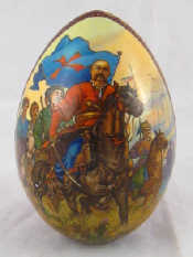 Appraisal: A Russian solid wooden Easter egg one face painted with