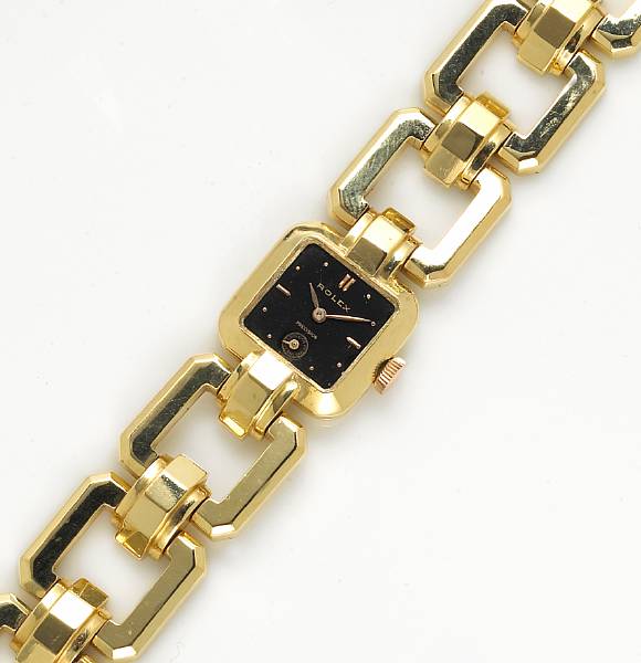 Appraisal: A Rolex lady's eighteen karat gold bracelet wristwatch weighing approximately