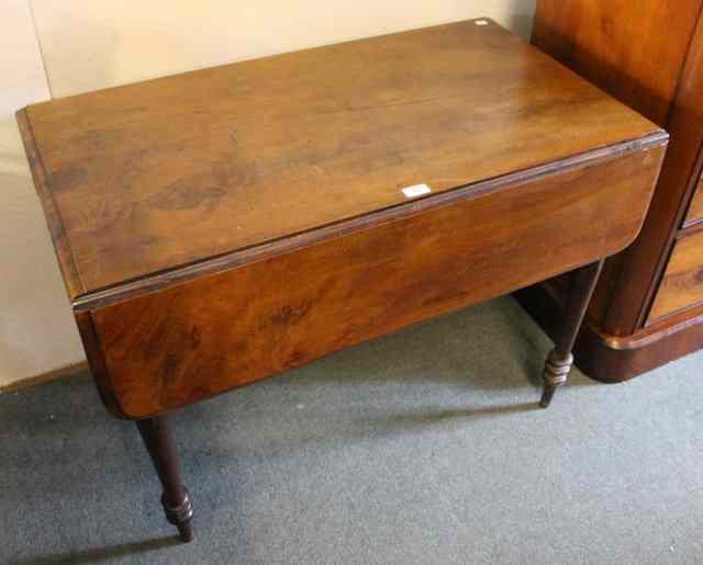 Appraisal: A TH CENTURY YEW WOOD PEMBROKE TABLE with drop flaps