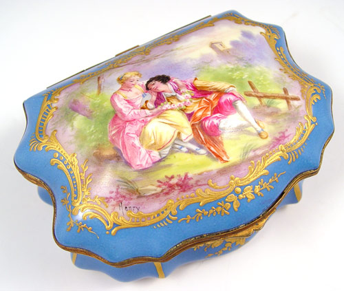 Appraisal: HAND PAINTED FRENCH PORCELAIN JEWELRY CASKET Hinged top centering a