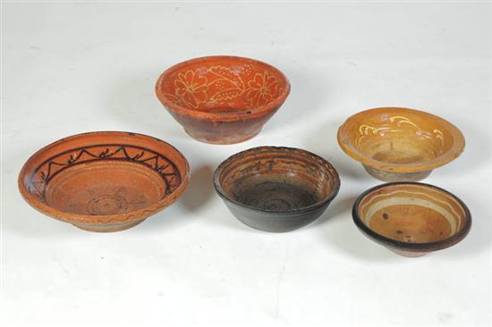 Appraisal: FIVE REDWARE MILK BOWLS American or European mid th century