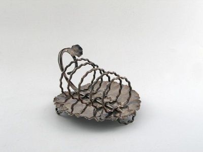 Appraisal: A late th century toast rack four division with a