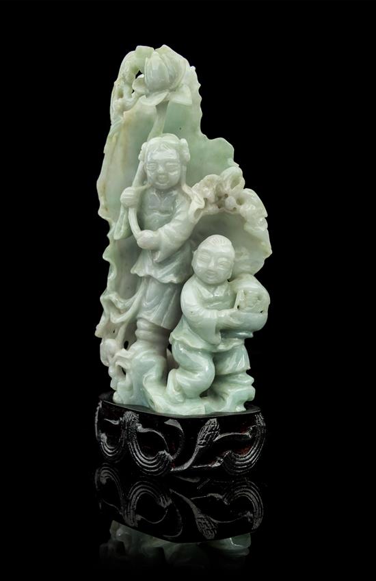 Appraisal: Sale Lot A Jadeite Carving the pale green carved to