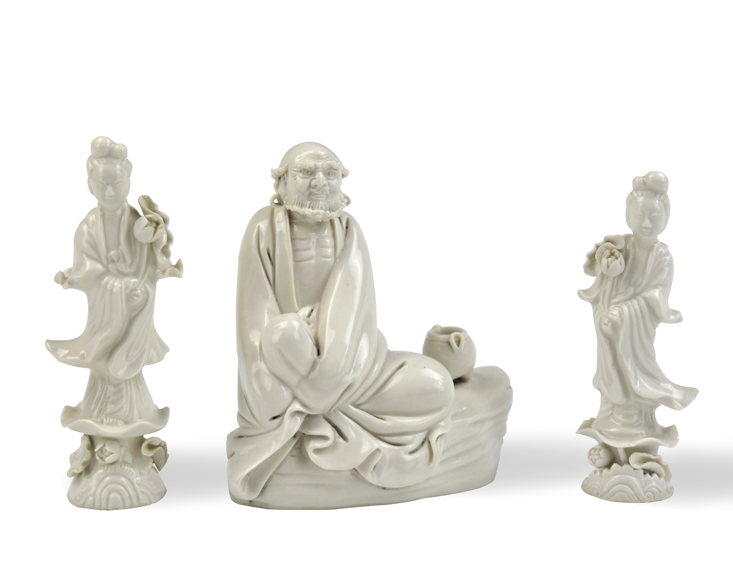 Appraisal: three dehua white glazed figure -one with an Damo in