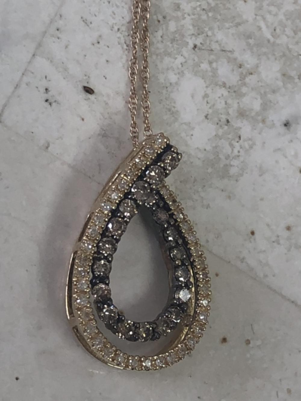 Appraisal: K YELLOW GOLD DIAMOND HORSESHOE PENDANT K yellow gold and