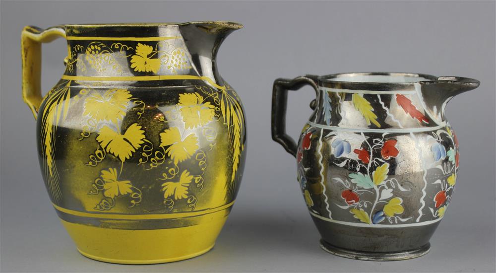 Appraisal: TWO SILVER RESIST JUGS mid th Century including one yellow