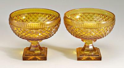 Appraisal: Pair amber cut glass compotes band of diamond cut decoration