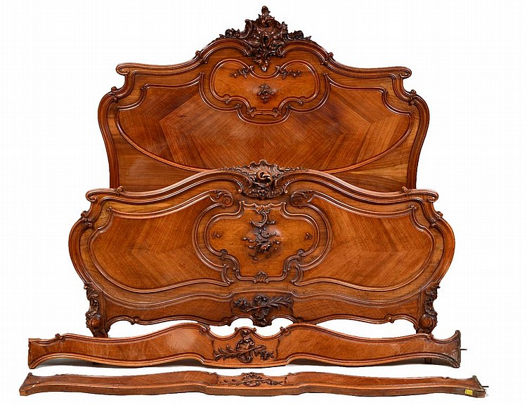 Appraisal: FINE LOUIS XV STYLE WALNUT BEDSTEADLate th Century Heavily carved