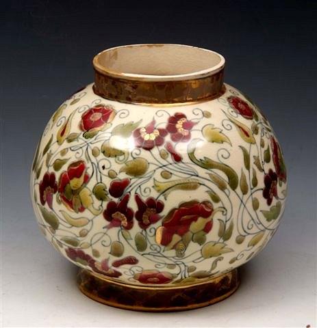 Appraisal: A ZSOLNAY BULBOUS VASE with all over foliage and flower