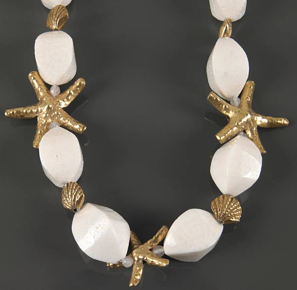 Appraisal: Without Reserve Comprising beads carved of white coral from the