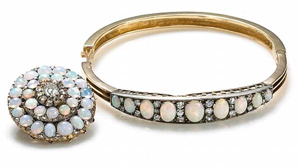 Appraisal: A collection of diamond opal k gold and silver jewelry