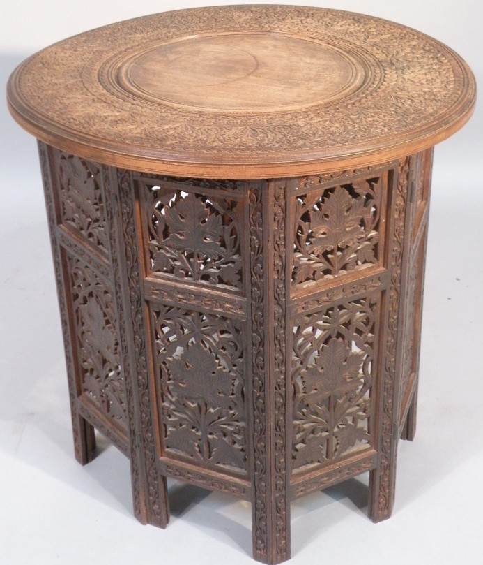 Appraisal: An early thC Indian hardwood occasional table the circular top