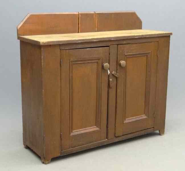 Appraisal: th c door cupboard in old red paint Found in