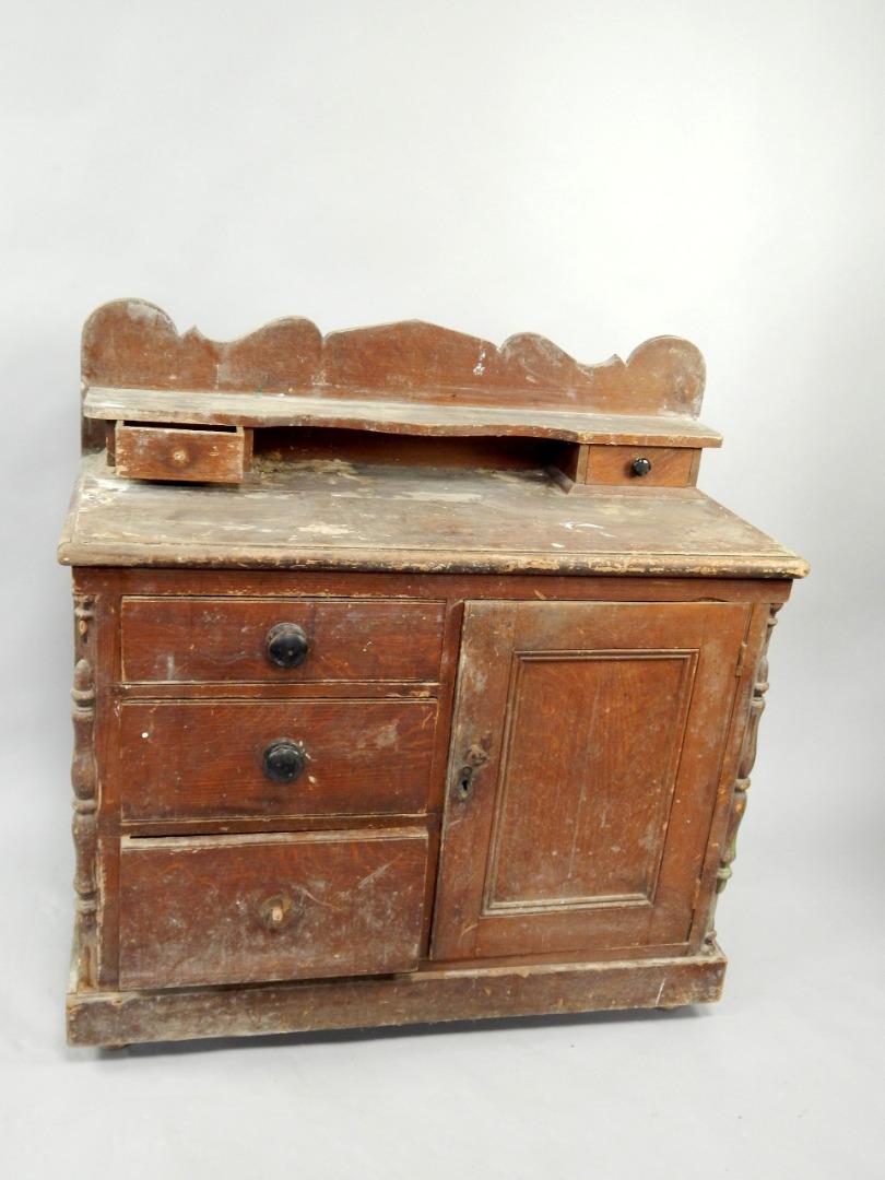 Appraisal: A Victorian Lincolnshire pine dresser with low gallery back fitted