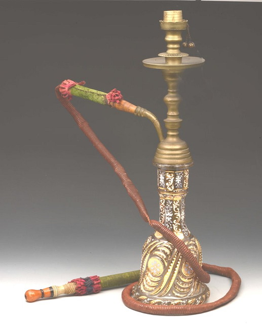 Appraisal: AN OTTOMAN STYLE GLASS AND METAL HOOKAH PIPE the base